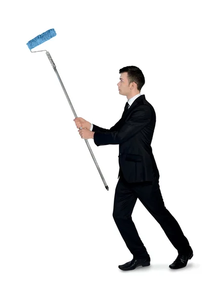 Business man with paint roller — Stock Photo, Image
