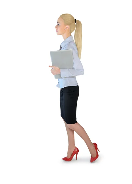 Business woman walking with laptop — Stock Photo, Image