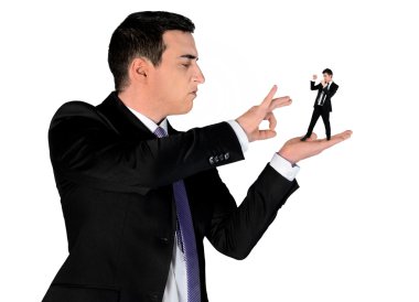 Business man finger flipping on little man