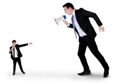 Business man screaming on megaphone