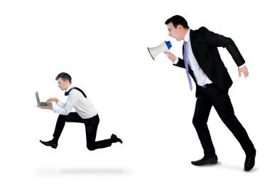 Business man screaming on megaphone