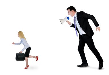 Business man screaming on megaphone 