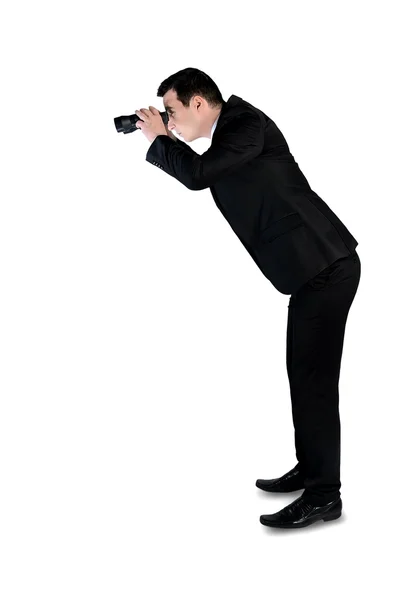 Business man with binoculars — Stock Photo, Image