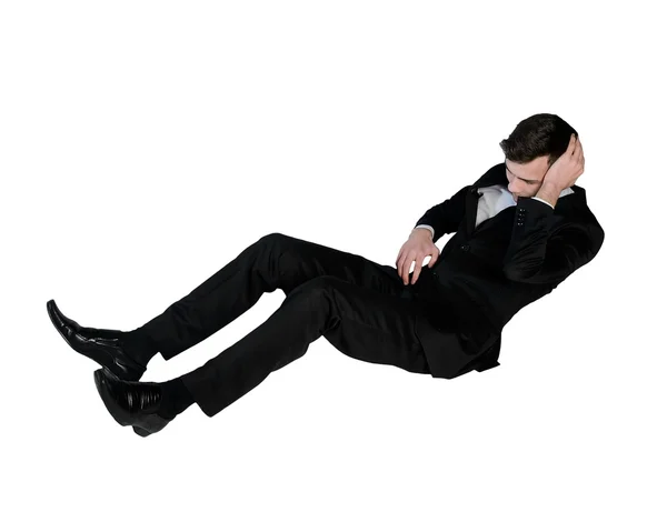 Hombre de negocios sufren en el suelo — Foto de Stock