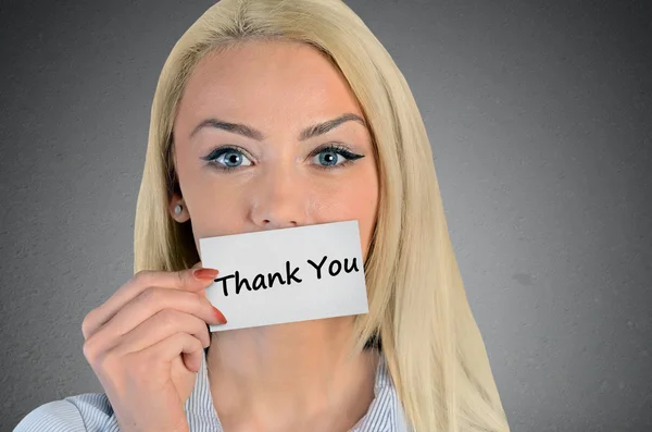 Woman holding card with Thank you word — Stok fotoğraf