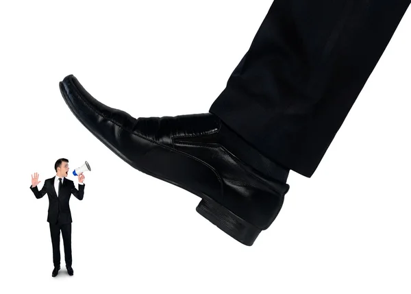 Feet man crushing little business man — Stockfoto