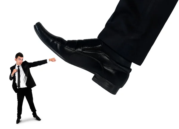 Feet man crushing little business man — Φωτογραφία Αρχείου