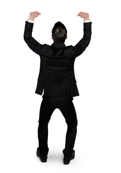 Business man lifting something Stock Picture