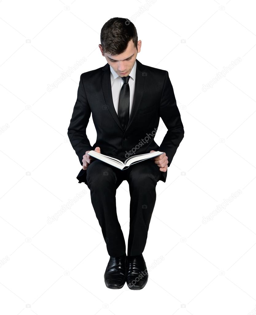 Business man reading book