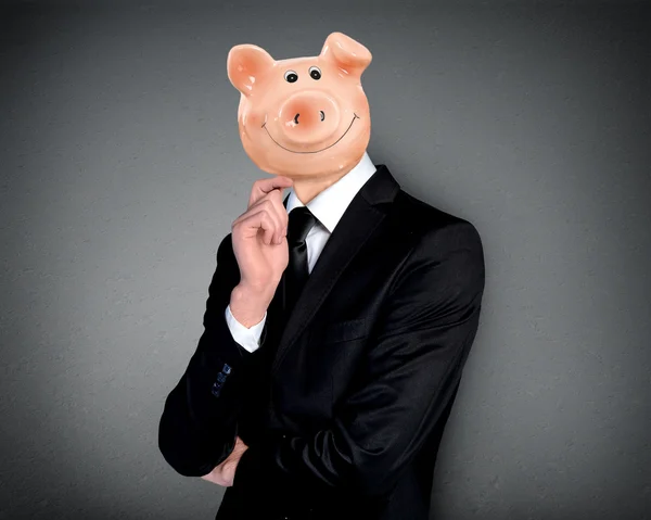 Piggy bank head business man — Stockfoto