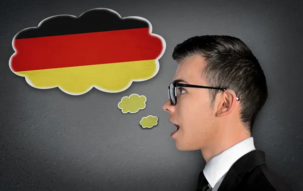 Man learn speaking german — стокове фото