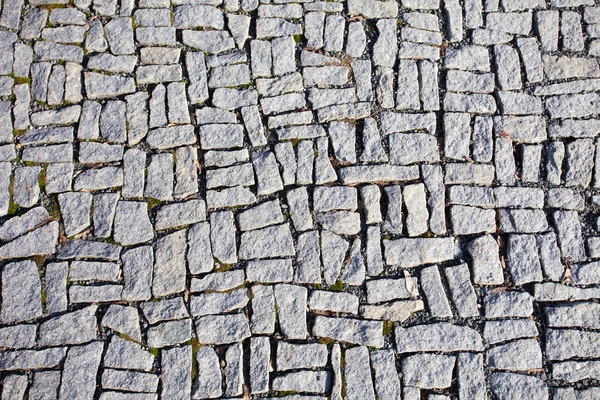 Square granite stones on the pavement background — Stock Photo, Image