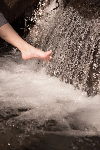 Foot in a waterfall — Stock Photo, Image