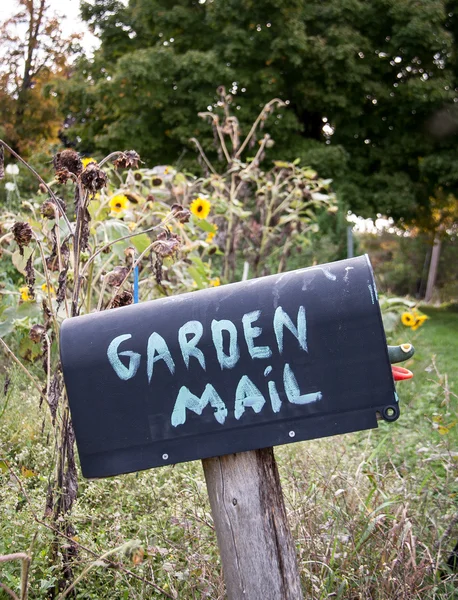 Mailbox with garden mail — Stock Photo, Image