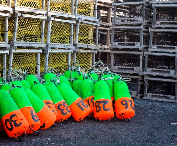 Bóias de lagosta verde e laranja — Fotografia de Stock