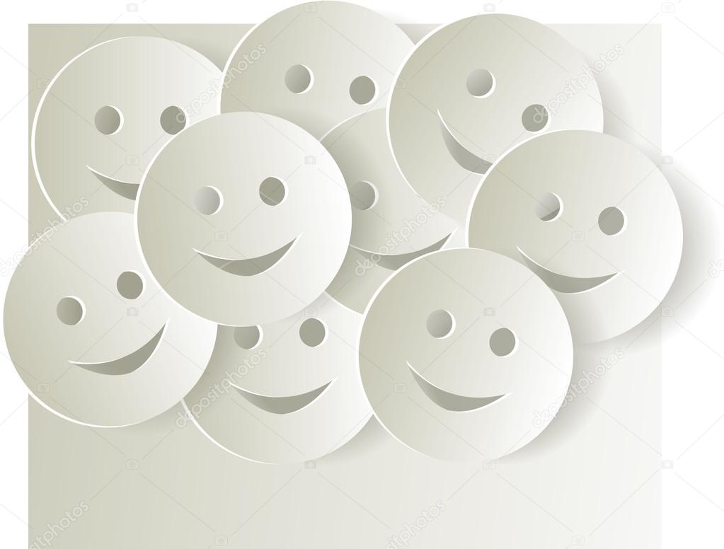 Paper cut out smiley faces on light background.