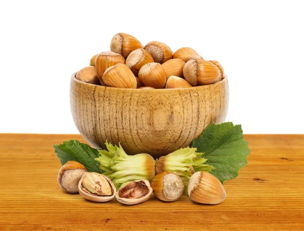 Hazelnuts in wooden pot — Stock Photo, Image