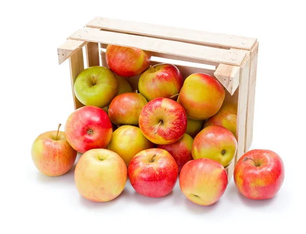 Ripe apples in wooden crate — Stock Photo, Image