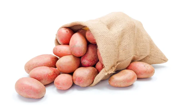 Red potatoes in sack — Stock Photo, Image