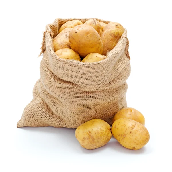 Λευκό πατάτες στο σάκο λινάτσα — Φωτογραφία Αρχείου
