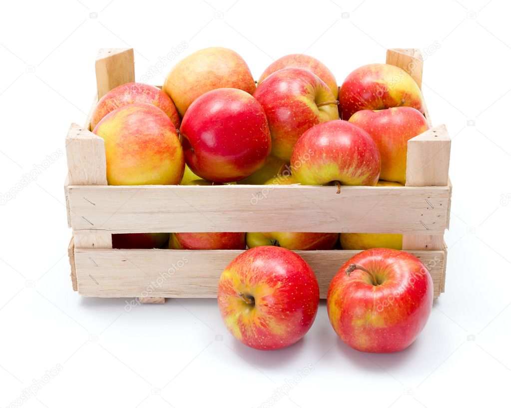 Ripe apples in wooden carte