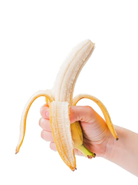Очищенный банан в руке — стоковое фото