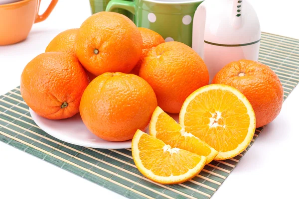 Appetizing oranges on plate — Stock Photo, Image