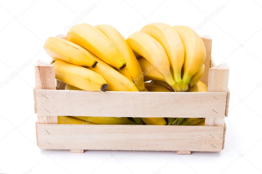 Bananas in wooden crate
