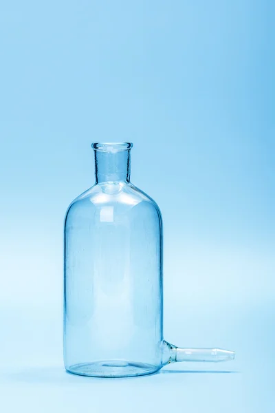 Empty clear filtering bottle — Stock Photo, Image