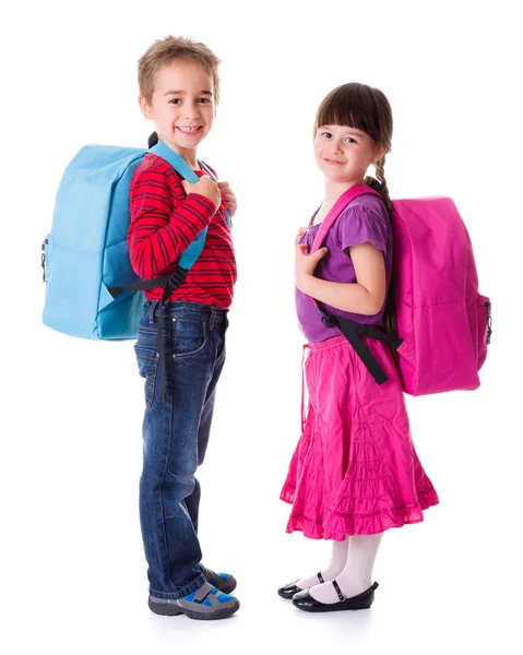 Pretty little schoolgirl and schoolboy — Stock Photo, Image