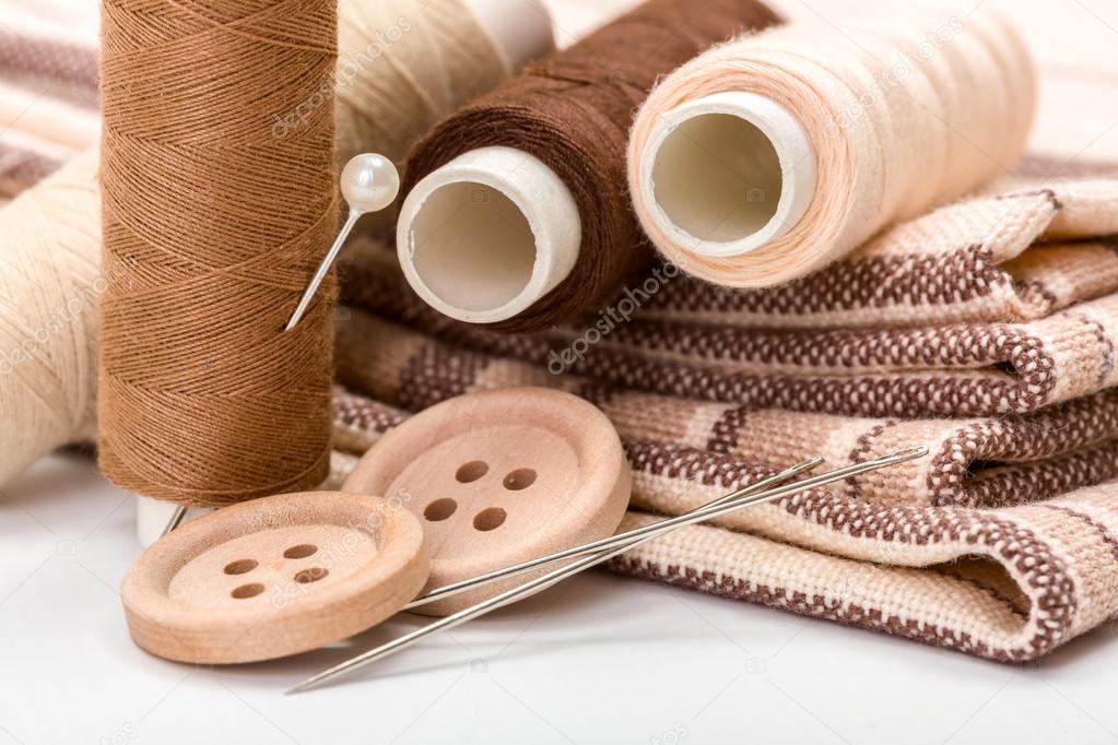 Brown sewing kit Stock Photo by ©erierika 76980957