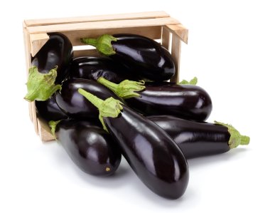 Eggplants (Solanum melongena) in wooden crate clipart