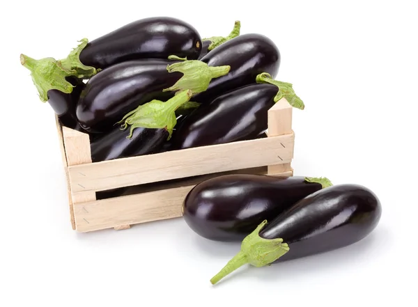 Eggplants (Solanum melongena) in wooden crate — Stockfoto