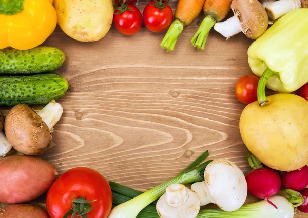 Various vegetables arranged around copy space — Stok fotoğraf