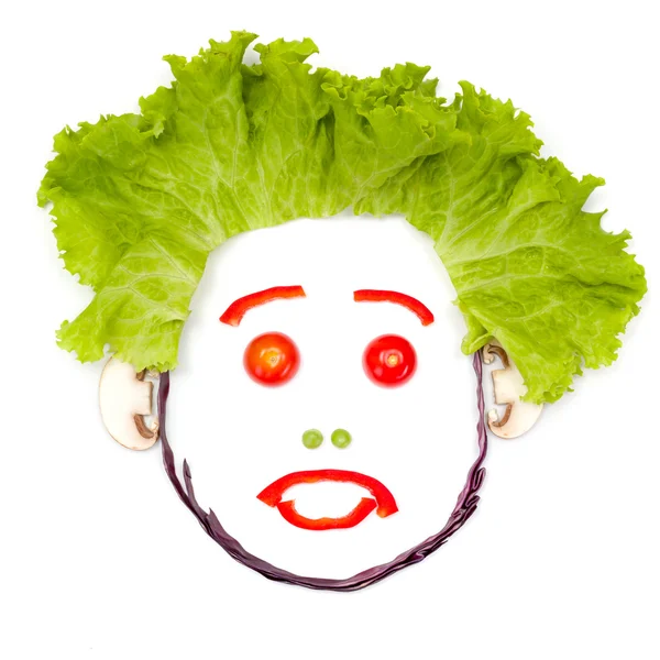 Sad surprised human head made of vegetables — Stockfoto