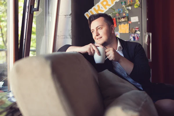 Young urban professional in startup office — Stock Photo, Image