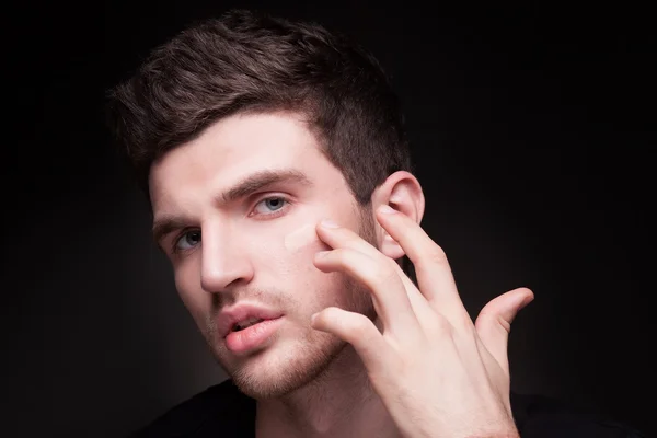 Stylish guy close up portrait on black background — Stock Photo, Image