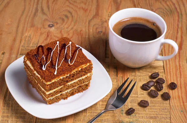 Koffiekopje en cake — Stockfoto