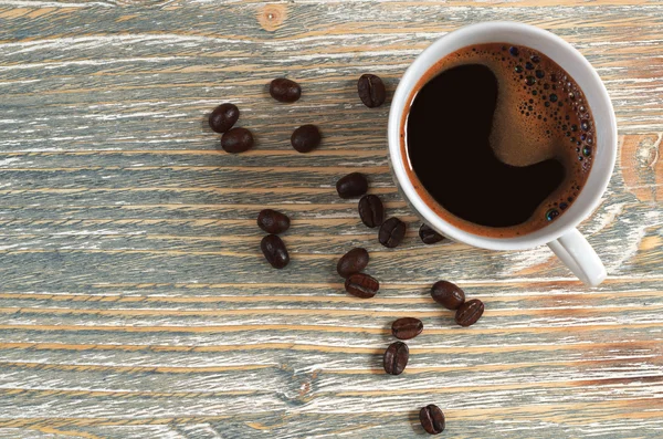 Xícara de café e feijão — Fotografia de Stock