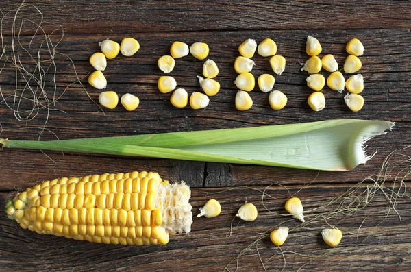 Grano en forma de palabra maíz —  Fotos de Stock