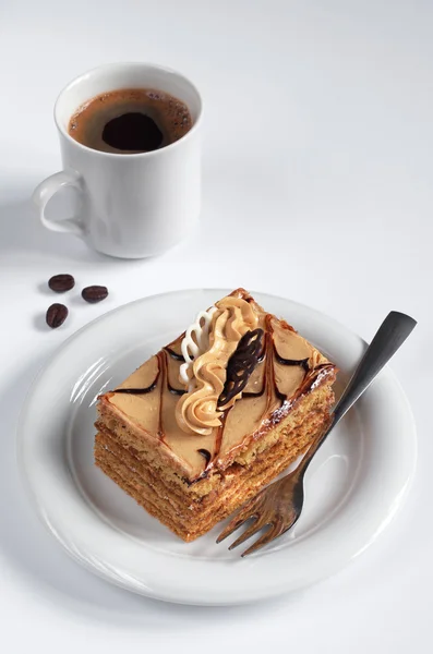 Honey cake with coffee — Stock Photo, Image