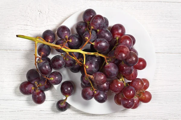 Grapes in plate — Stock Photo, Image