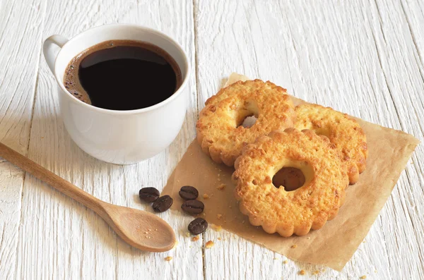 Biscoitos e xícara de café — Fotografia de Stock