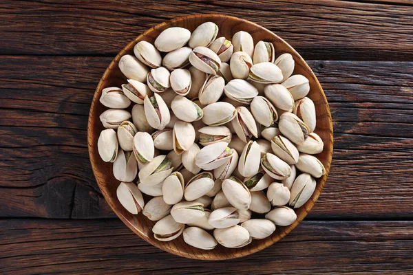 Nueces Pistacho Plato Madera Sobre Mesa Vista Superior — Foto de Stock