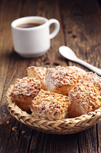 Puff cookies with nuts and coffee — Stock Photo, Image