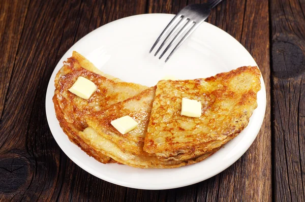 Fried pancakes with butter — Stock Photo, Image