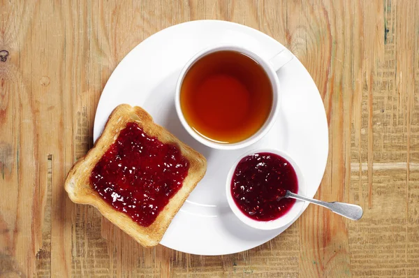 Čaj a topinky s marmeládou — Stock fotografie