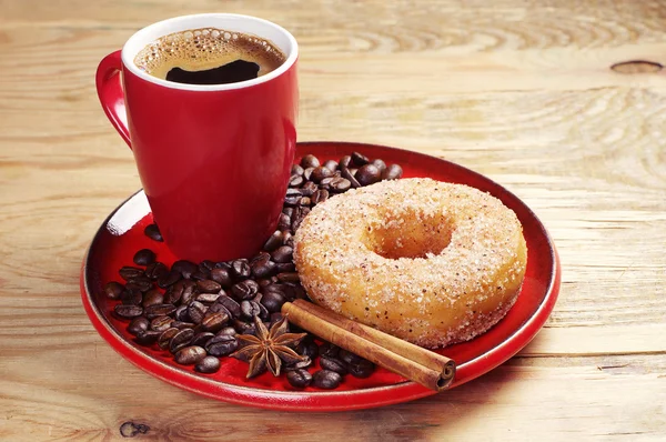 Placa con rosquilla y café — Foto de Stock