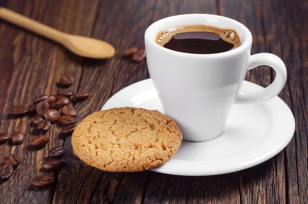 Coffee with oatmeal cookie — Stock Photo, Image