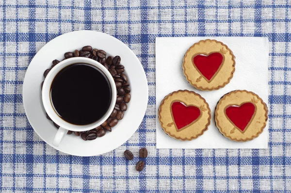 Cup of black coffee and cookies — Stock Photo, Image